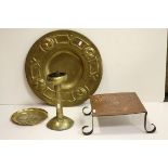 A group of Arts and Crafts metalware to include copper charger ,dish,candlestick and trivet.
