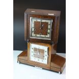 An Art Deco Three train movement mantle clock with inlaid decoration together with a similar oak