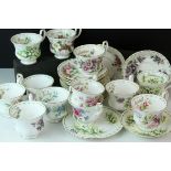 Twelve Royal Albert ' Flowers of the Month ' Cups and Saucers plus a Tea Plate