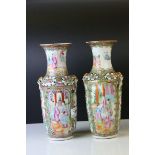 Pair of Chinese Cantonese Famille Rose Vases with enamelled decoration including figures, birds,