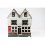 A vintage wooden dolls house.