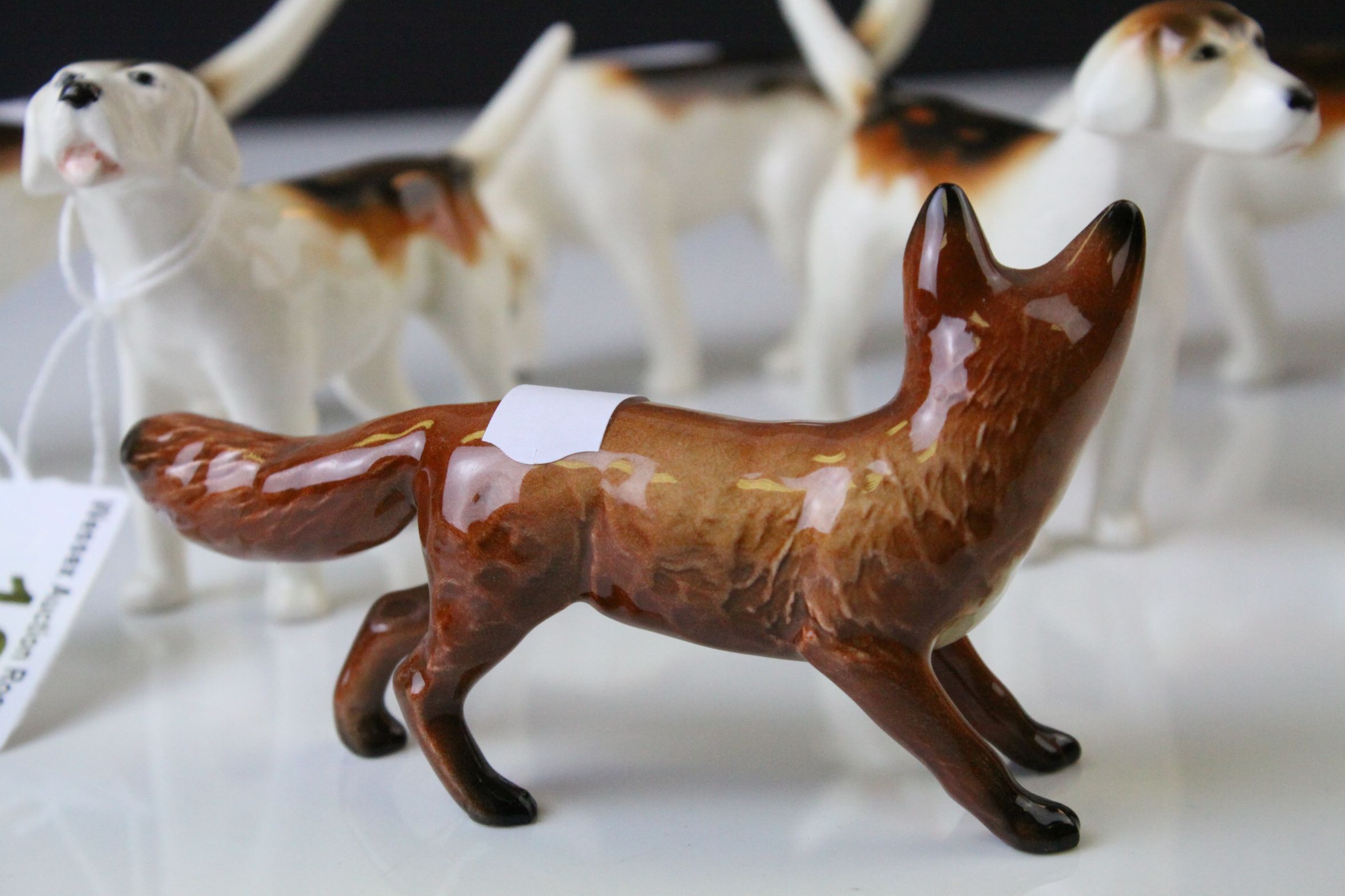 Beswick Fox model 1440 and Seven Beswick Fox Hounds including one model 941, two model 942, two - Image 3 of 12