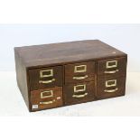 Early 20th century Oak Bank of Six Office Filing Drawers, with George V engraved on the Brass