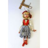 A vintage Pelham puppet in the form of a dutch girl.