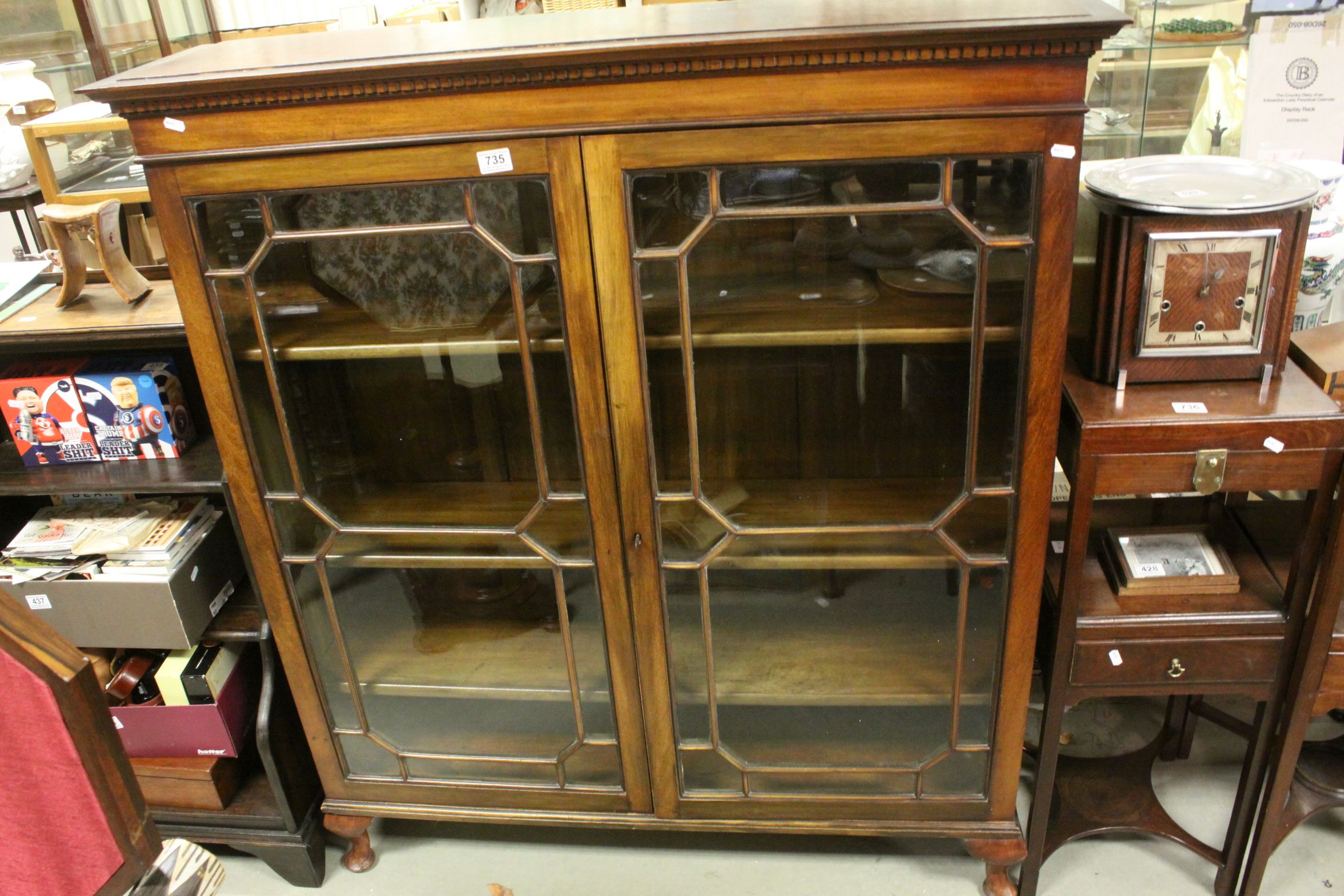 George III Mahogany Bookcase with Two Astragel Glazed Doors opening to reveal three adjustable