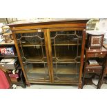 George III Mahogany Bookcase with Two Astragel Glazed Doors opening to reveal three adjustable