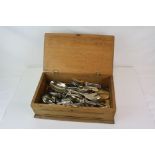 A wooden box containing 60 pieces of Flatware including 12 marked Nevada Silver and 5 marked