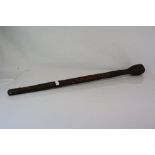 A vintage Asian leather covered stick with decorative tooling (Possibly sword stick).