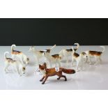 Beswick Fox model 1440 and Seven Beswick Fox Hounds including one model 941, two model 942, two