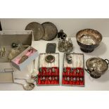 A quantity of silver plate to include footed bowl,hip flask coasters circular box with dog