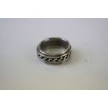 Silver Ring with wave design raised on central band