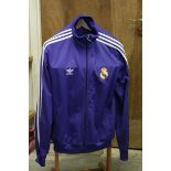 An Original Adidas Real Madrid football tracksuit top