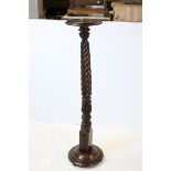 Victorian Mahogany Torchere /Jardiniere Stand raised on a carved twisted support and circular