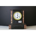 An early 20th century slate mantle clock with single train movement.