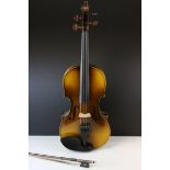 Czechoslovakian Violin and Bow with paper label marked Antonius Stradivarius Cremonensis,
