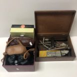 Three cased sets of Binoculars to include Nikon,Optilyth and a Bolex boxed cine camera plus a Wooden