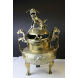 Chinese Polished Brass Censor, the lid surmounted by a Dog of Foo Finial, the body with Dragon