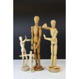 Four Wooden Articulated Artist's Dummy Figures, largest 33cms high