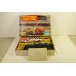 Boxed Triang Scalextric Set 65 with both original slot cars, appears to be complete but unchecked