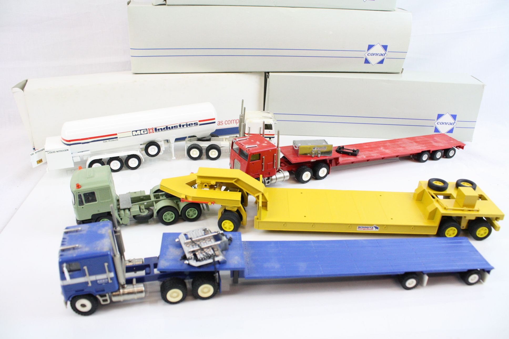 Four boxed Conrad diecast haulage models, to include Red Freightliner, Blue Freightliner, MAN - Image 6 of 6