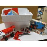 Boxed Lego 4.5V Motor Set with Rubber Tracks, appearing complete but unchecked. Plus a quantity of