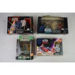 Four boxed & carded Star Wars vehicles and action figures to include Sith Speeder & Darth Maul,