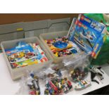 Large quantity of assembled Lego models with boxes, appearing complete but unchecked
