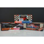 Three boxed Scalextric slot cars to include Triang C7 Rally Mini Cooper in red, Rally C130 Triumph