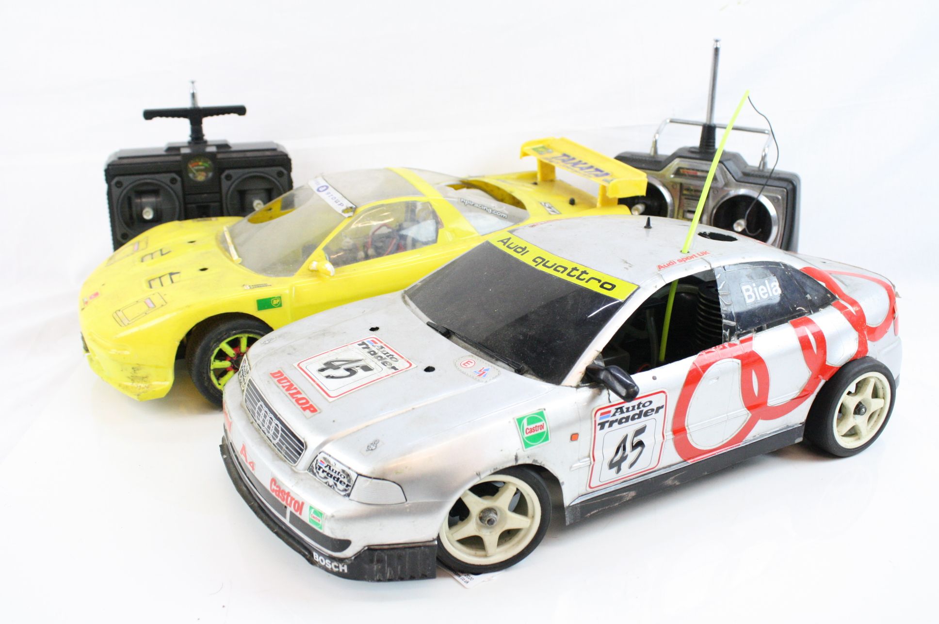 A Kyosho Nitro 4WD remote control car on an alloy chassis with a belt driven GX11X engine and a