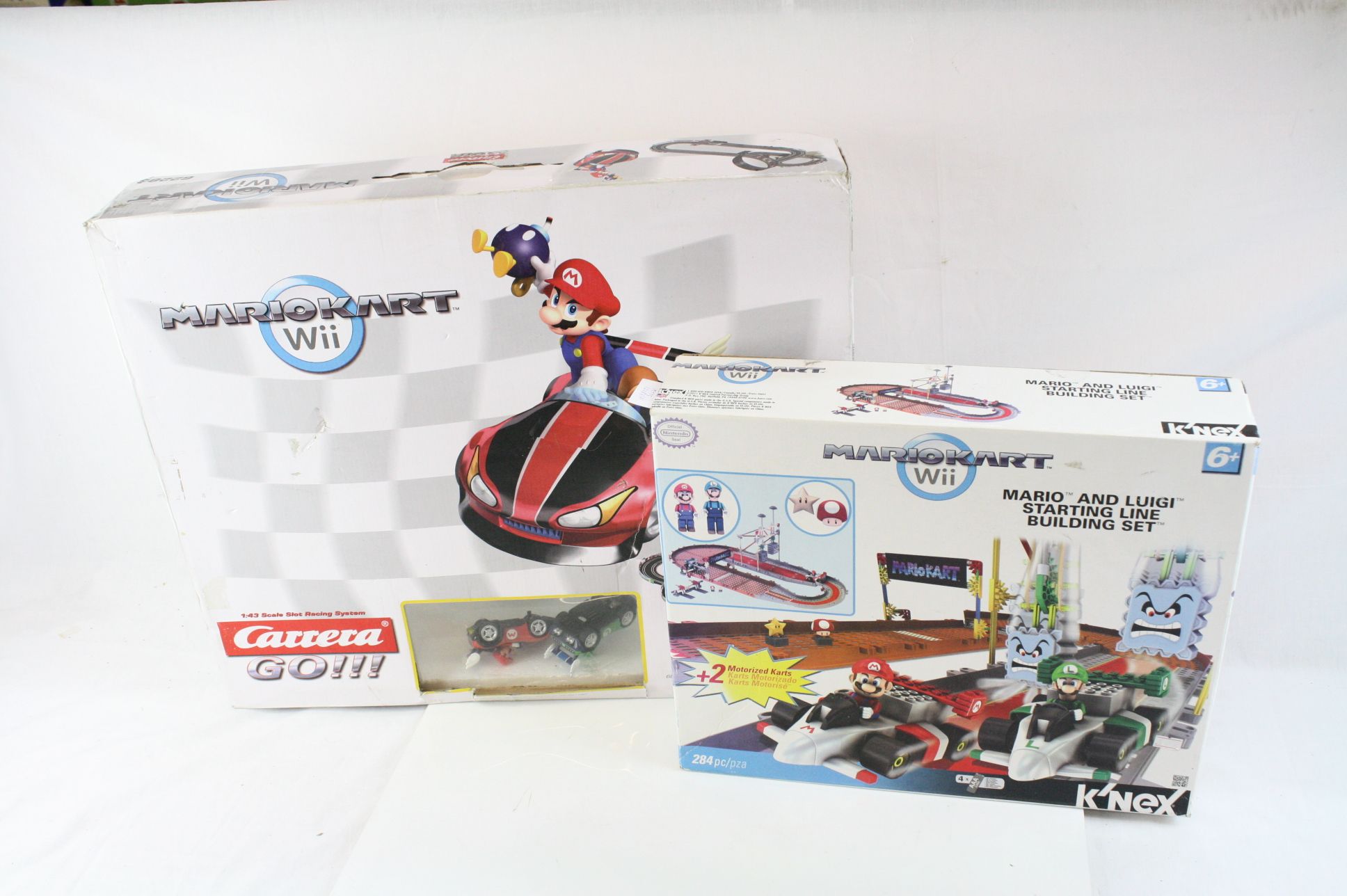 Boxed Carrera Go Nintendo Mario Kart 1:43 slot car racing set and boxed K'Nex Nintendo Mario Kart