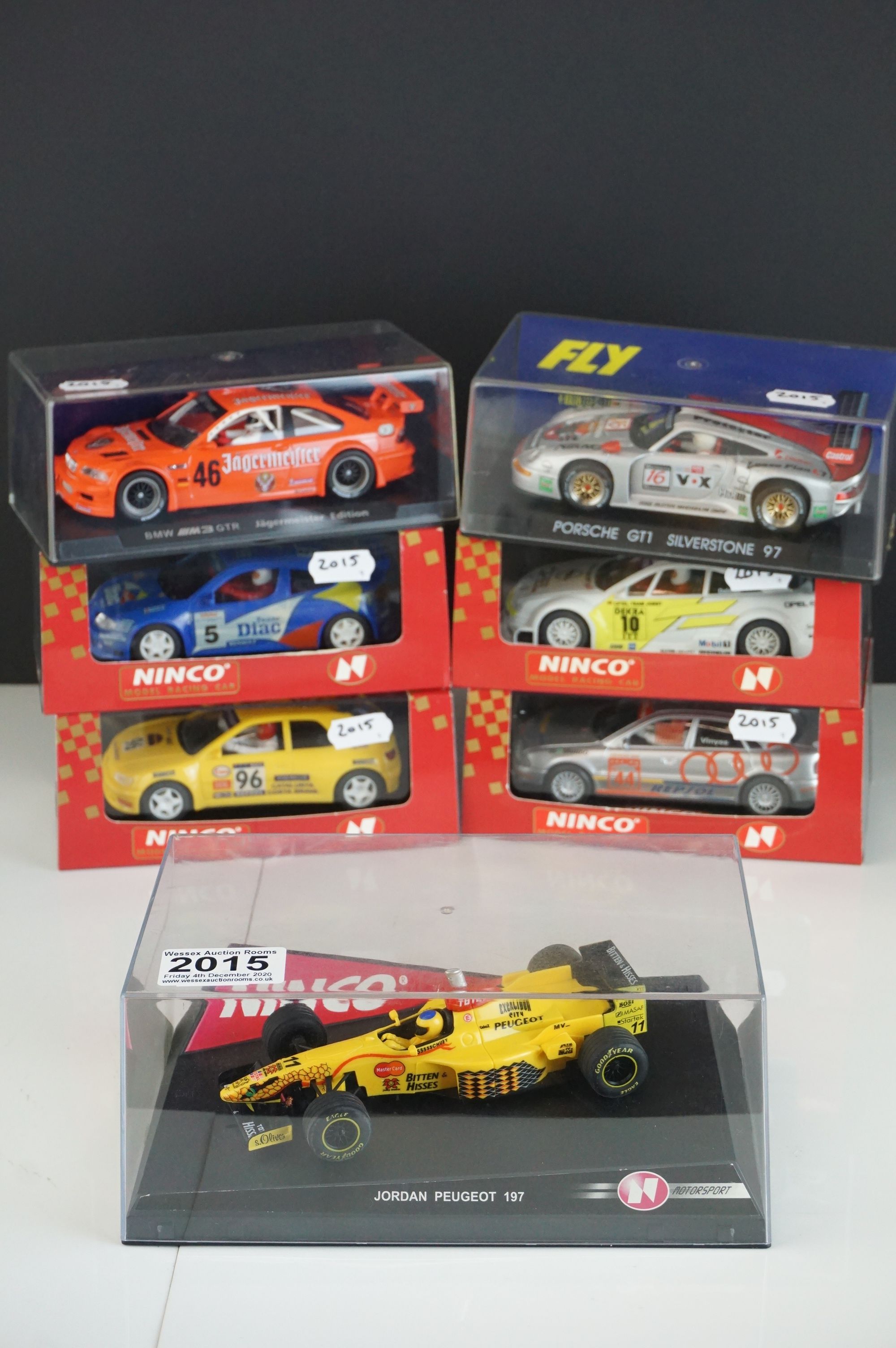 Seven cased / boxed slot cars to include 5 x Nimco (50172 Jordan 197 German Driver, 50128 Peugeot