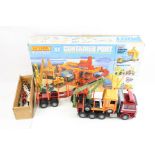 Emek Muovi Oy (Finland) plastic Loglift 95, a diecats cab and a boxed Matchbox PS1 Container Port (