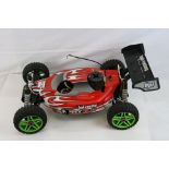 HPI Racing trophy 3.5 Nitro RC Buggy 1/8 Scale together with glow plug heater and Acoms transmitter.