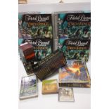 Four Lord of the Rings Trivial Pursuit board games, plus The Hobbit: The Defeat of the Evil Dragon