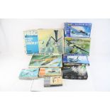 Nine plastic models kits to include 3 x Revell featuring 1:144 scale General Dynamics F-111C, 2 x