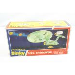 Boxed Dinky 358 Star Trek USS Enterprise diecast model with 6 x missile, unused sticker sheet, and