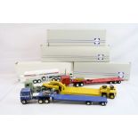Four boxed Conrad diecast haulage models, to include Red Freightliner, Blue Freightliner, MAN