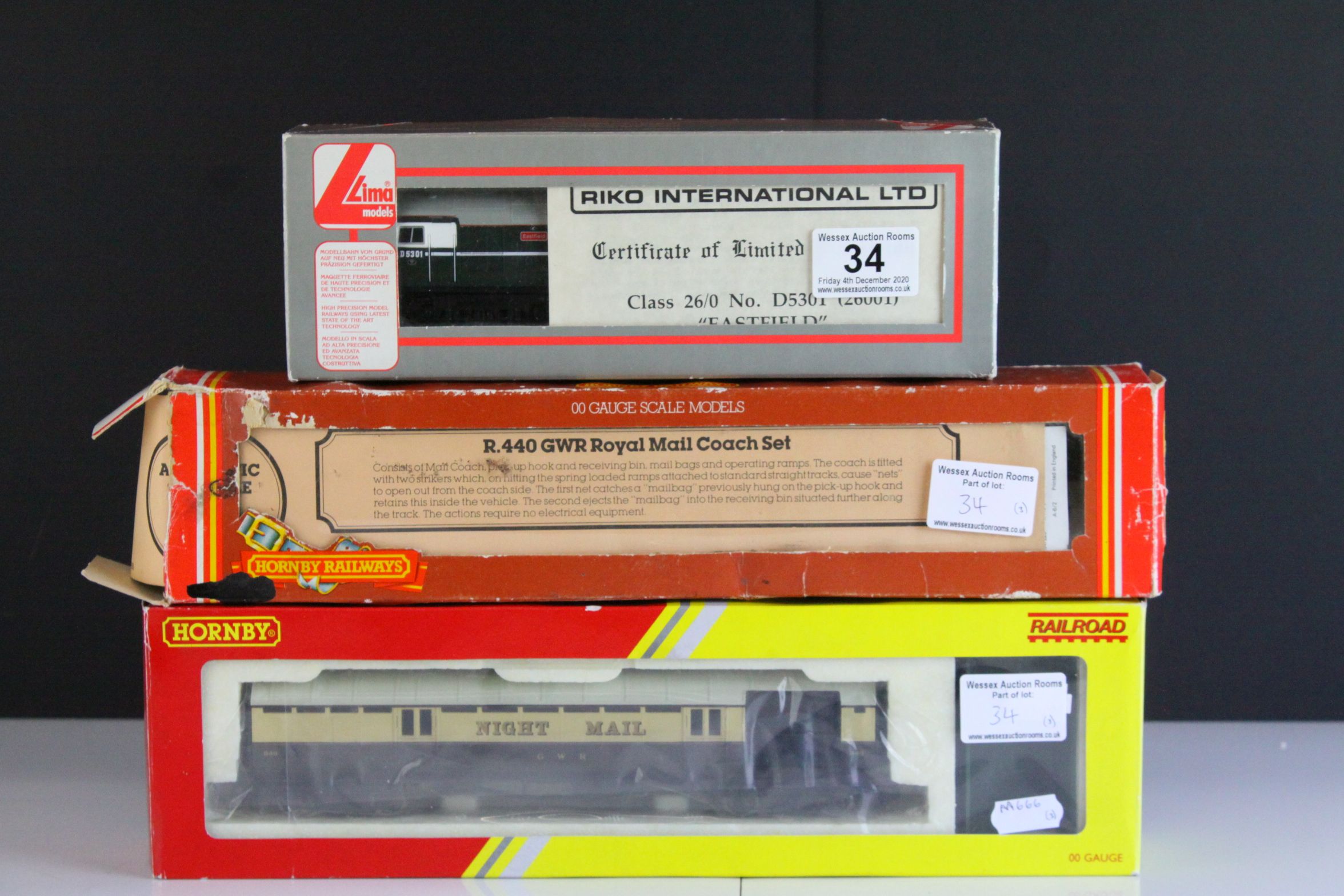 Boxed Lima OO gauge Eastfield locomotive plus a boxed Hornby R4526 Operating Mail Coach 849 and