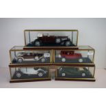 Five cased 1:18 scale diecast model vintage cars to include Mercedes, Morgan etc, models fixed to