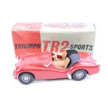 Boxed Victory Industries battery operated Triumph TR2 Sports diecast / plastic replica model, with