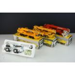 Four boxed NZG1/50 diecast construction models to include Demag HC170 Sparrows, Demag HC130, Demag