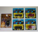 Four carded ERTL Batman diecast models to include 2 x Batmobile and 2 x Joker Van plus a carded