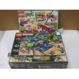 Two boxed Lego sets to include Basic Building Set 735 and Arachnoid Star Base 6977. Appears complete