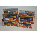 Four boxed Dinky diecast models to include 201 Plymouth Stock Car x3 & 390 Customised Freeway