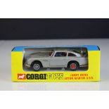 Boxed Corgi 270 James Bond 007 Aston Martin DB5 diecast model in blue/yellow box window, appearing