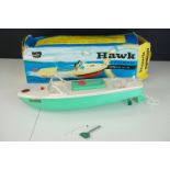 Boxed Sutcliffe Models Clockwork Hawk Speed Boat in white and turquoise, vg condition, with key, box