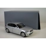 Boxed 1:18 Kyosho BMW 1 Series diecast model, box is opened but the model is in vg condition.