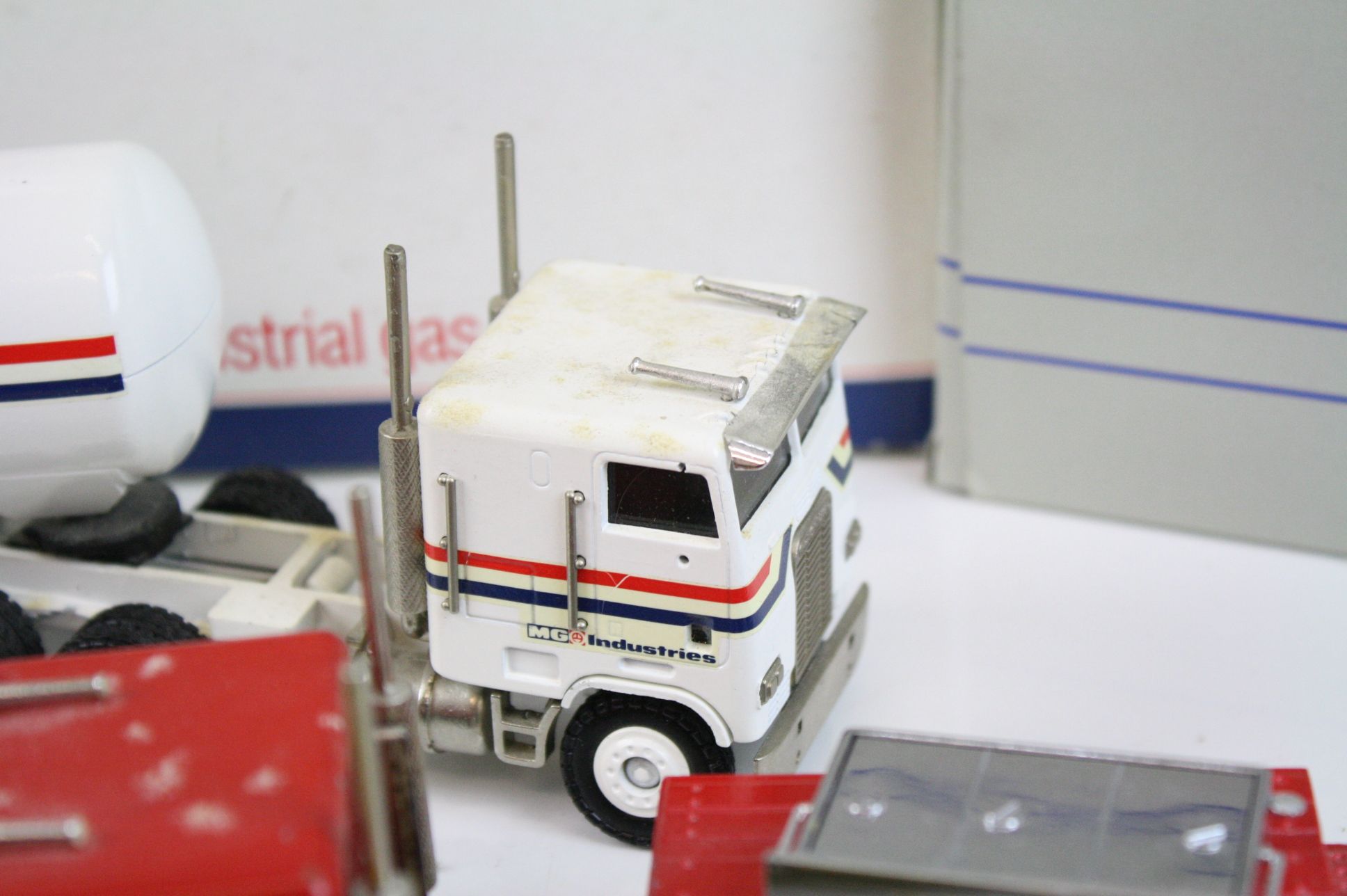 Four boxed Conrad diecast haulage models, to include Red Freightliner, Blue Freightliner, MAN - Image 5 of 6