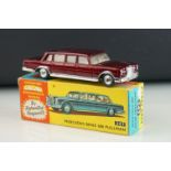 Boxed Corgi 247 Mercedes Benz 600 Pullman By Special Request diecast model in metallic maroon,