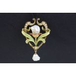 Art Nouveau pearl enamelled brooch, the central baroque pearl forming the flower head, enamelled
